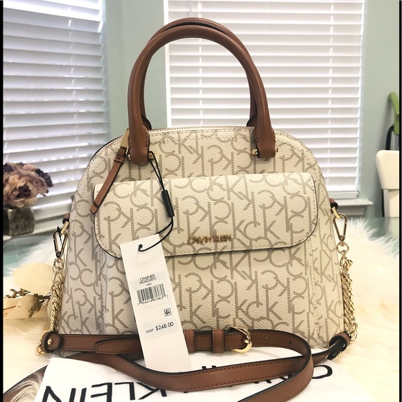 Calvin Klein Handbags - Calvin Klein
Chained Daytona Leather Satchel Bag